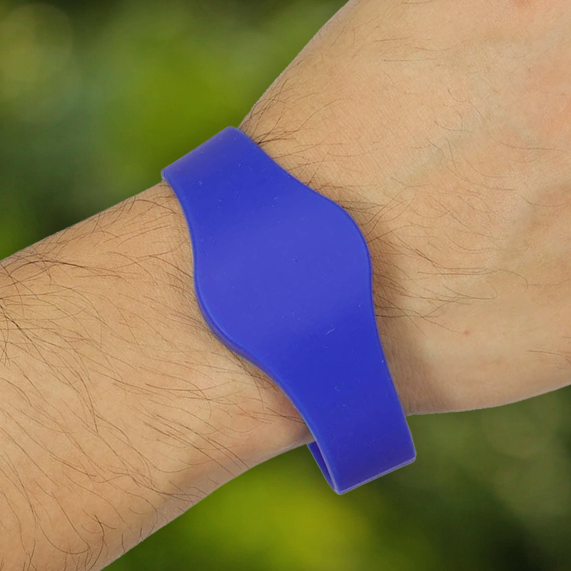 Person wearing an access control RFID bracelet wristband